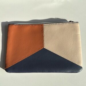 IPSY Bag, navy blue, brown, and cream